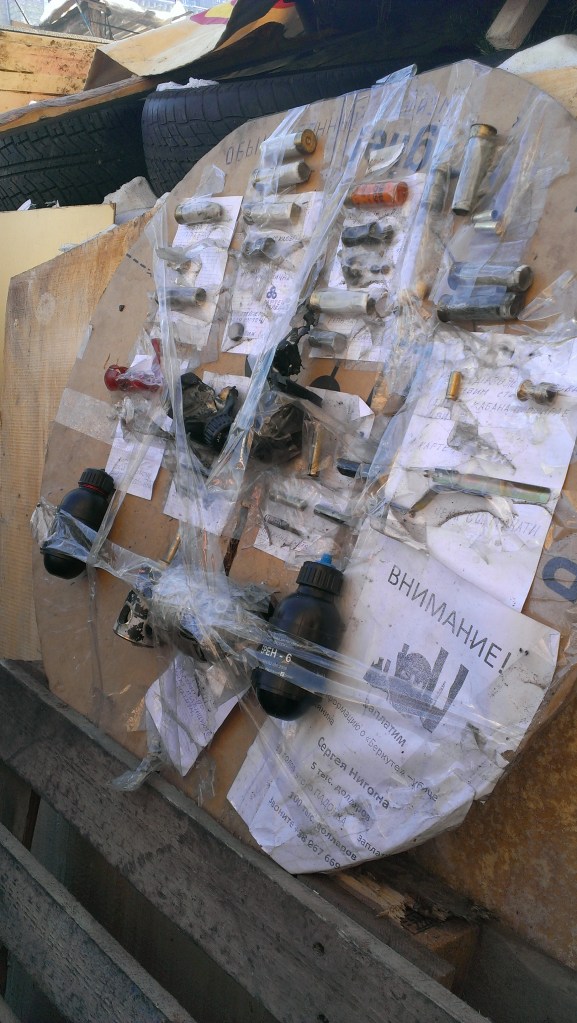 Remains of weapons used against the Ukrainian protesters on the Maidan: rubber and metal bullets, concussion and stun grenades wrapped in shrapnel-to-be, and skin-splitting rounds for maximum blood loss.