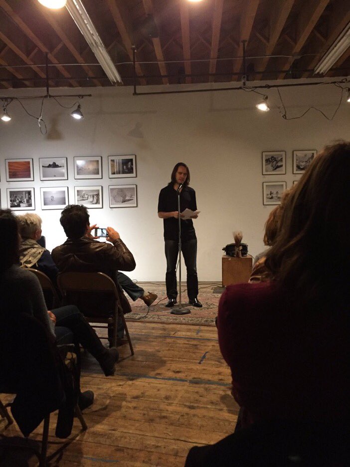 Arthur Klepchukov reading "The Price of Chivalry" at Lit Camp's Basement Series on November 4, 2016